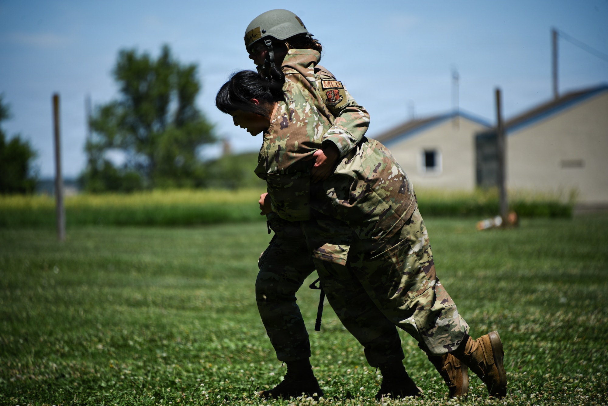 U.S. Airmen assigned to the 185th Air Refueling Wing’s Medical Group carry patients during the Wing’s first Tactical Combat Casualty Care exercise in Sioux City Iowa, June 12, 2026.