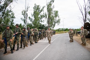 Security Forces Airmen from the Tennessee Air National Guard and Bulgarian Air Force form up before starting the capstone exercise for Falcon Defender 26,  Graf Ignatievo Air Base, Plovdiv, Bulgaria, June 12, 2026. Falcon Defender is an exercise integrating both the Tennessee Air National Guard and Bulgarian force protection Airmen to help strengthen bonds and build upon relationships brought about by the state partnership between the Tennessee National Guard and the Republic of Bulgaria since 1993. (Air National Guard photo by Tech. Sgt. Cassandra Johnson)