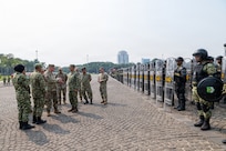 U.S. Army Maj. Gen. Stephen F. Logan, adjutant general of the Hawaii National Guard, and members of the Hawaii National Guard delegation receive a capabilities briefing from Indonesian Army leaders during a riot control equipment demonstration at the National Monument in Jakarta, Indonesia, June 11, 2026.
