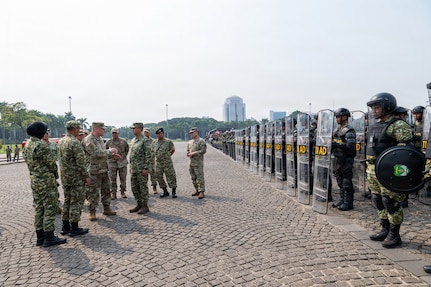 U.S. Army Maj. Gen. Stephen F. Logan, adjutant general of the Hawaii National Guard, and members of the Hawaii National Guard delegation receive a capabilities briefing from Indonesian Army leaders during a riot control equipment demonstration at the National Monument in Jakarta, Indonesia, June 11, 2026.