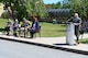 Photo of Deputy Commander Robert Lantka at podium with Tobyhanna command and Zardecki family in the background