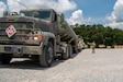 The 737th Transportation Company stage their M915 tractor trucks, towing M1062 bulk petroleum fuel tanks, in the motor pool before convoying to Keesler Air Force Base during Operation Sentinel Justice at Camp Shelby, Mississippi, June 11, 2026. Operation Sentinel Justice is the crucible of the modern U.S. Army Reserve. OSJ is the largest training event in the history of the Army Reserve, with an estimated 12,000-15,000 Soldiers participating. The training event is comprised of Combat Support Training Exercise (CSTX) 26-01, Global Medic, and a Tech Evaluation (TECH EVAL) spread across Camp Shelby, MS, Camp Beauregard, LA, & Gulfport, MS. The CSTX is designed to assess and enhance the readiness and capabilities of Army Reserve Soldiers in a modern, dynamic, multi-echelon, and joint operational environment aimed at preparing the force for Large Scale Combat Operations. (U.S. Army photo by Pfc. Belle Mcpherren)