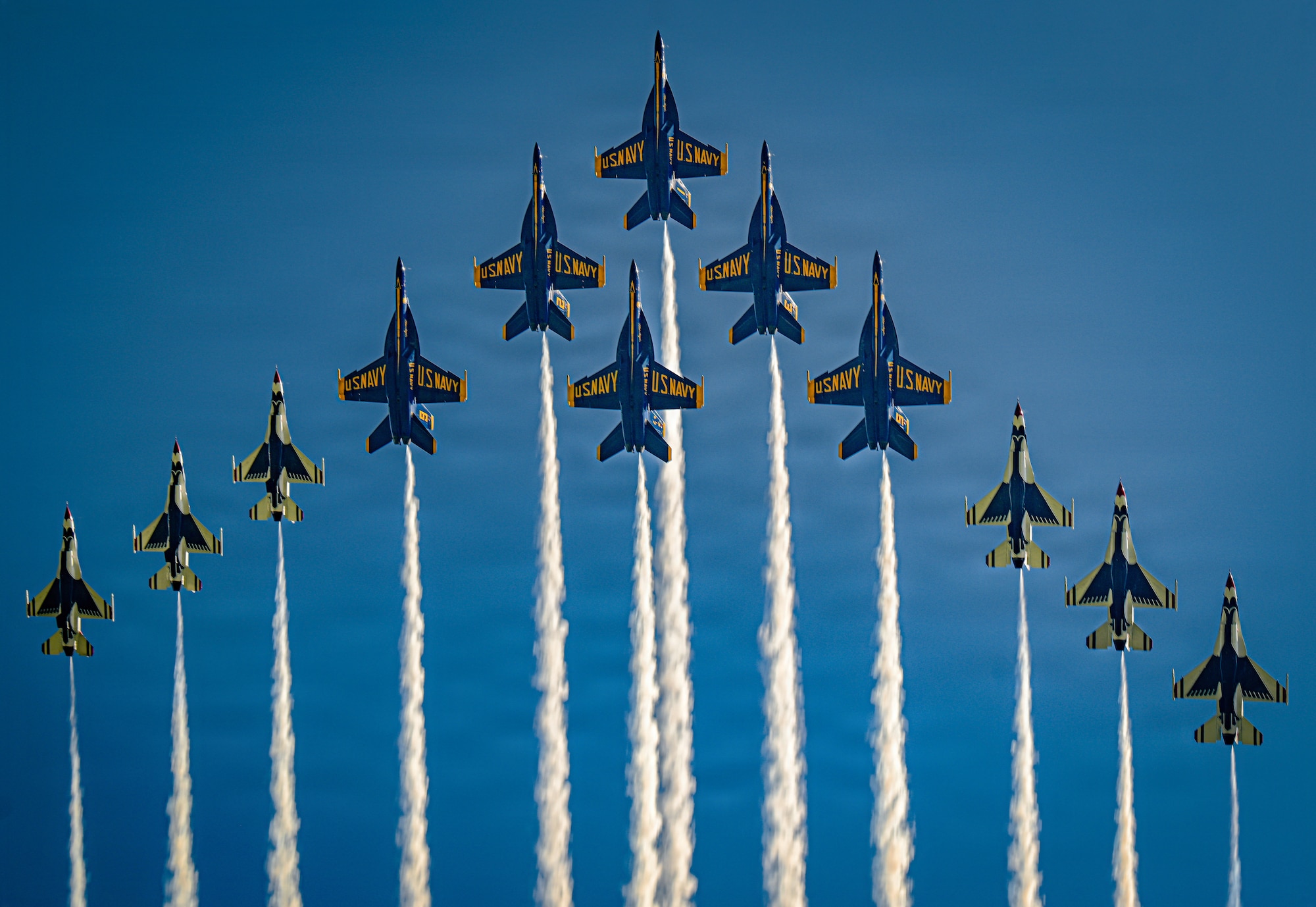 Military demonstration aircraft flying.