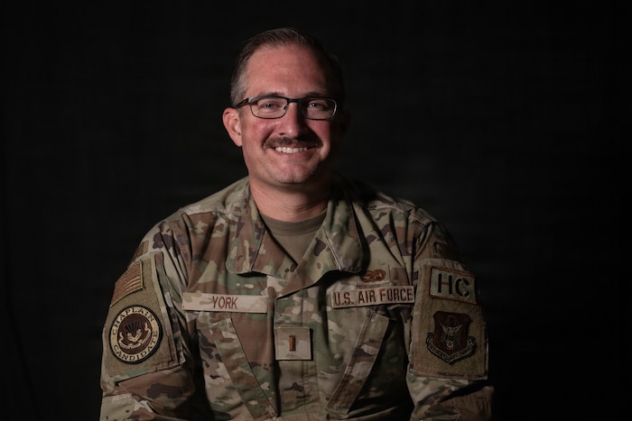 U.S. Air Force 2nd Lt. Kevin York, Air Force Mortuary Affairs Operations chaplain candidate, poses for a photo on Dover Air Force Base, Delaware, June 18, 2026. York will work with the AFMAO resilience team for one month as a part of his program. (U.S. Air Force photo by Staff Sgt. Madeline Baisey)