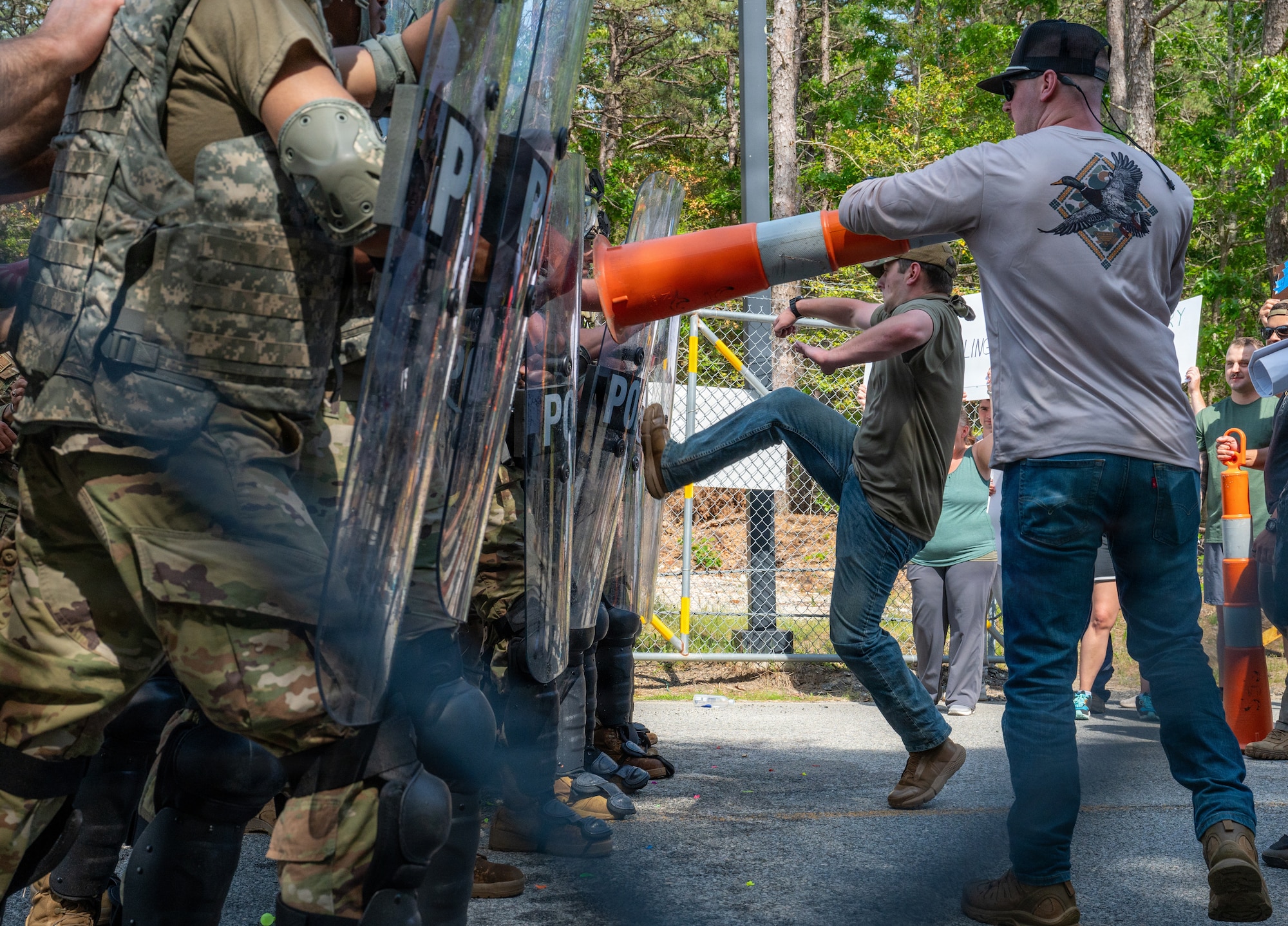 Photo of ANG Airmen performing their jobs during a military exercise.