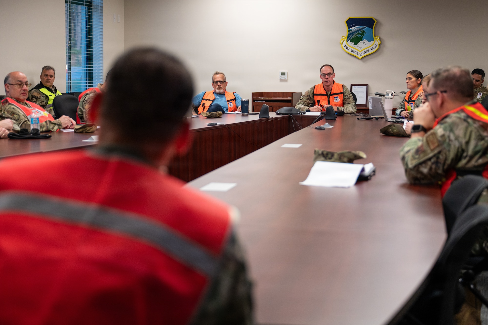 Photo of ANG Airmen performing their jobs during a military exercise.
