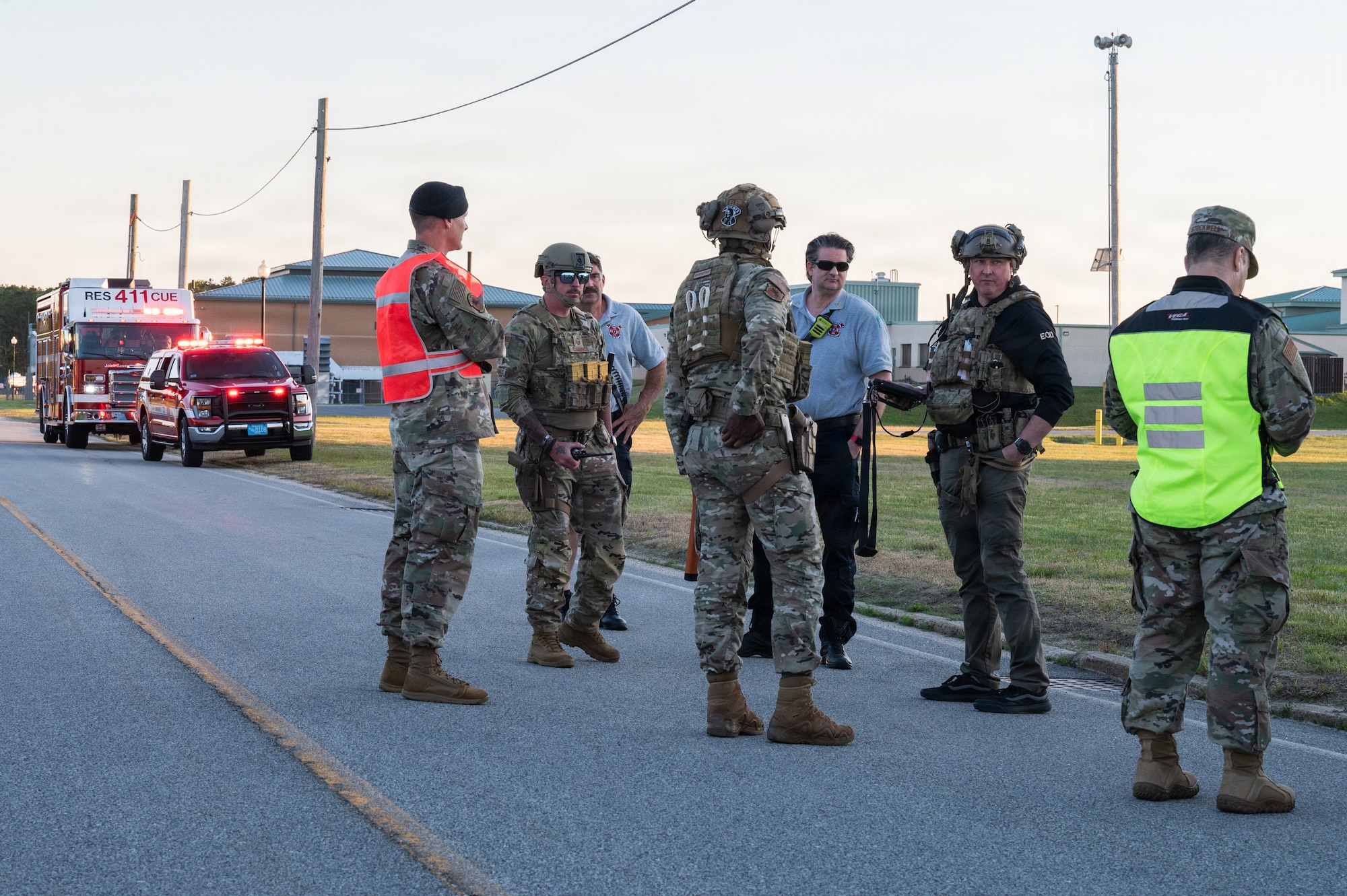 Photo of ANG Airmen performing their jobs during a military exercise.