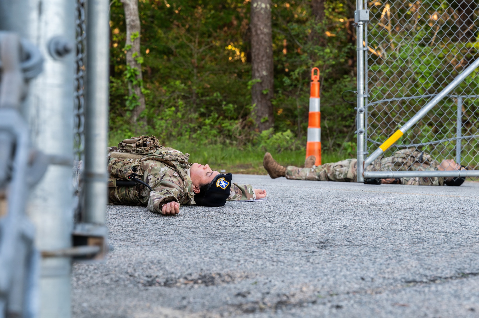 Photo of ANG Airmen performing their jobs during a military exercise.
