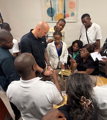 Lt. Cmdr. Patrick Marsh, assigned to Naval Hospital Jacksonville, teaches aspects of Trauma Nursing and Surgical Trauma Training during a two-week course held at Angola Armed Forces Military Hospital in Luanda, Angola, Africa. A few days after the course, a real-world incident occurred, closely mimicking the recent training evolutions.