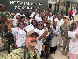Lt. Cmdr. Patrick Marsh, assigned to Naval Hospital Jacksonville, poses for a photo with participants in his two-week Trauma Nursing and Surgical Trauma Training at the Angola Armed Forces Military Hospital in Luanda, Angola, Africa. Marsh was name-selected to lead the training. (Courtesy photo)