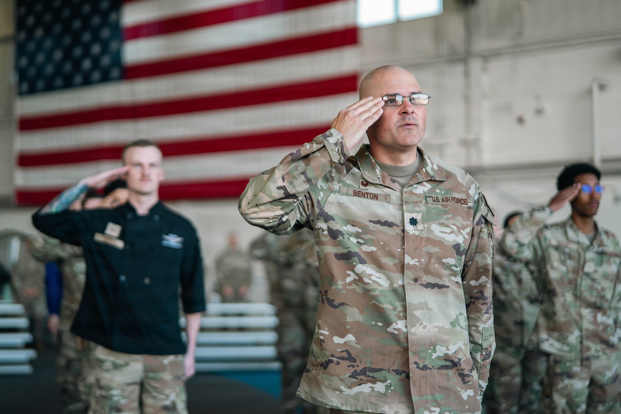 U.S. Air Force Lt. Col. Kendall Benton, commander of the 673d Security Forces Squadron, and service members of the 673d Mission Support Group render a final salute during the 673d MSG change-of-command ceremony on Joint Base Elmendorf-Richardson, Alaska, June 18, 2026. The 673d MSG is composed of five squadrons – the 773d Force Support Squadron, the 673d Communications Squadron, the 673d SFS, the 673d Contracting Squadron and the 673d Force Support Squadron – providing support to the 673d Air Base Wing and 55 associate and tenant units assigned to JBER. (U.S. Air Force photo by Airman 1st Class Keola Vischi)