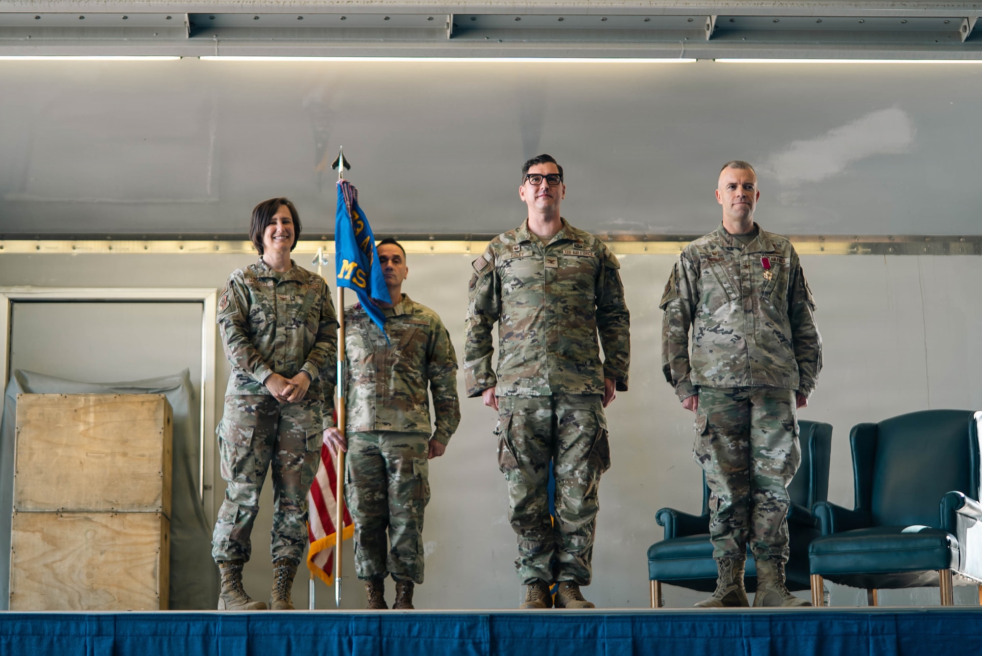 From left: U.S. Air Force Col. Lisa Mabbutt, Joint Base Elmendorf-Richardson and 673d Air Base Wing commander; Col. Jacob Foley, incoming 673d Mission Support Group commander; and Col. Dustin Hansen, outgoing 673d MSG commander, stand at the position of attention during the conclusion of the 673d MSG change-of-command on JBER, Alaska, June 18, 2026. The 673d MSG is composed of five squadrons – the 773d Force Support Squadron, the 673d Communications Squadron, the 673d Security Forces Squadron, the 673d Contracting Squadron and the 673d Force Support Squadron – providing support to the 673d Air Base Wing and 55 associate and tenant units assigned to JBER. (U.S. Air Force photo by Airman 1st Class Keola Vischi)
