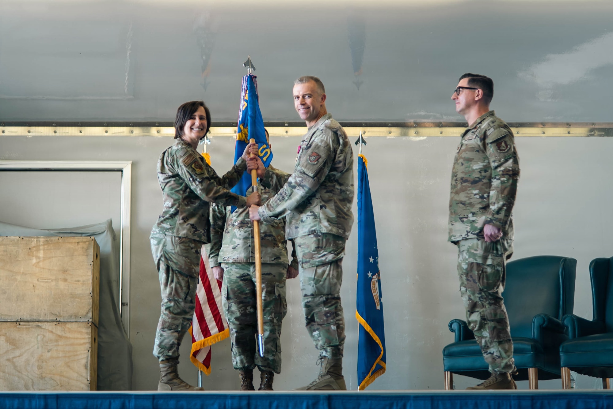 U.S. Air Force Col. Dustin Hansen, outgoing 673d Mission Support Group commander, right, relinquishes command to Col. Lisa Mabbutt, Joint Base Elmendorf-Richardson and 673d Air Base Wing commander, during the 673d MSG change-of-command ceremony on JBER, Alaska, June 18, 2026. The 673d MSG is composed of five squadrons – the 773d Force Support Squadron, the 673d Communications Squadron, the 673d Security Forces Squadron, the 673d Contracting Squadron and the 673d Force Support Squadron – providing support to the 673d Air Base Wing and 55 associate and tenant units assigned to JBER. (U.S. Air Force photo by Airman 1st Class Keola Vischi)