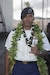 U.S. Army Sgt. Isaac Atkins, a horizontal construction engineer assigned to 538th Engineer Support Company, 65th Engineer Battalion, 25th Division Sustainment Brigade, 25th Infantry Division, poses for a photo in his Army Service Uniform, adorned with traditional Hawaiian leis, after completing Basic Leaders Course on Schofield Barracks, Hawaii, October 2025.