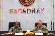 U.S. Army Maj. Gen. Stephen F. Logan (right), adjutant general of the Hawaii National Guard, and Lt. Gen. TNI Gabriel Lema, head of Indonesia's National Reserve Agency (Bacadnas), share a discussion during a key leader engagement at Bacadnas headquarters in Jakarta, Indonesia, June 9, 2026.