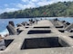 Lava stone shoreline and blue ocean