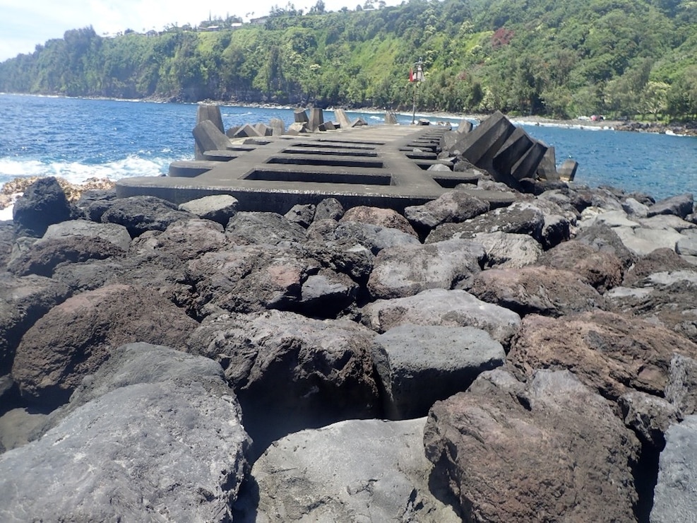 Lava stone shoreline and blue ocean
