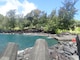 Lava stone shoreline and blue ocean
