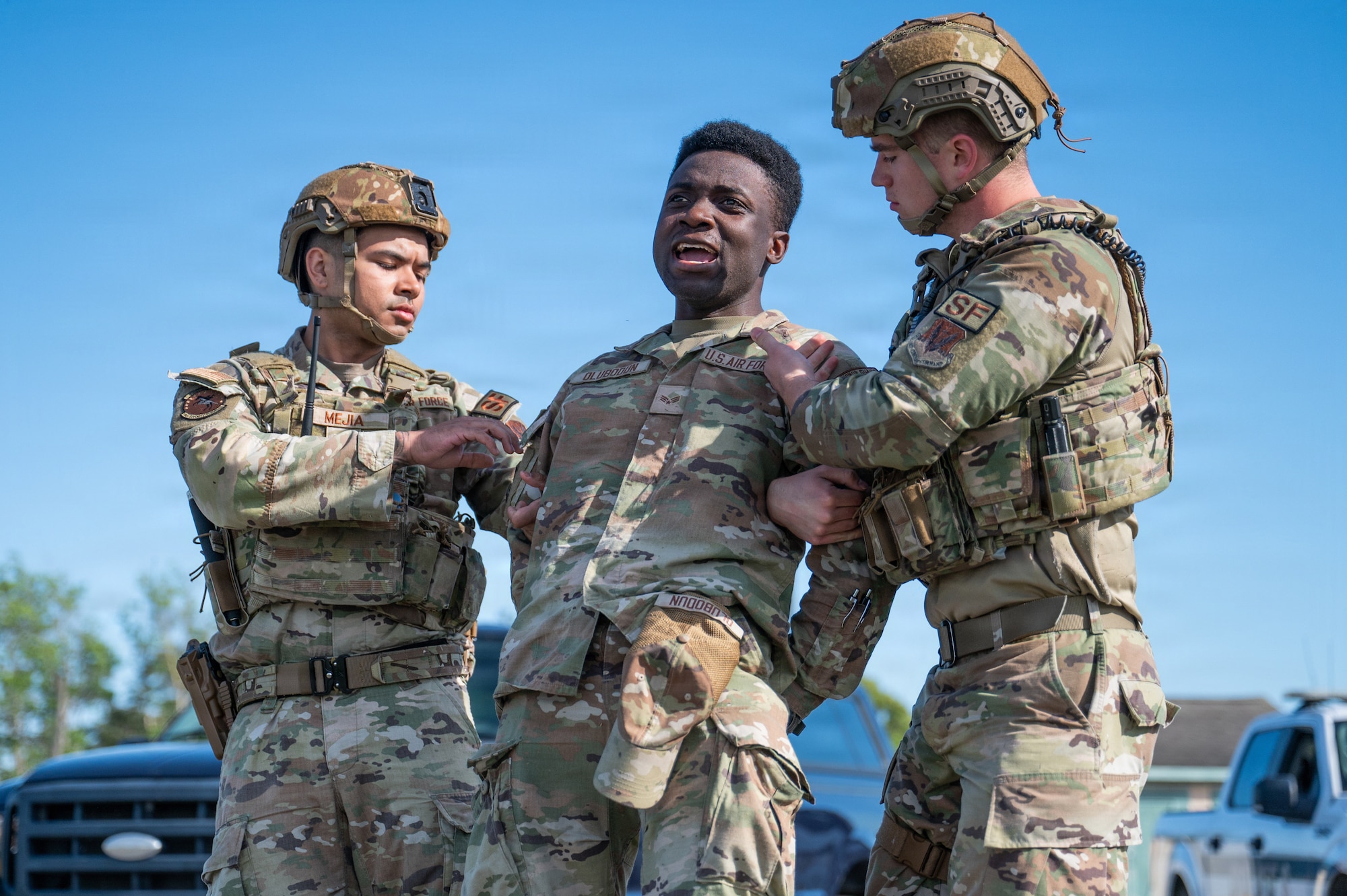 Airmen performing their assigned duties during a military exercise.