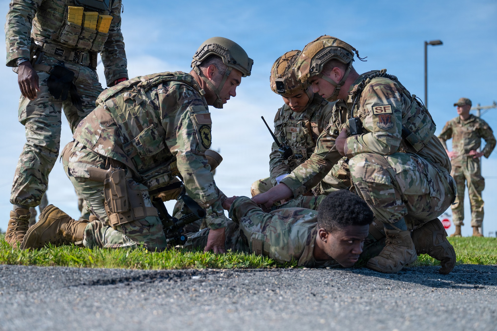 Airmen performing their assigned duties during a military exercise.