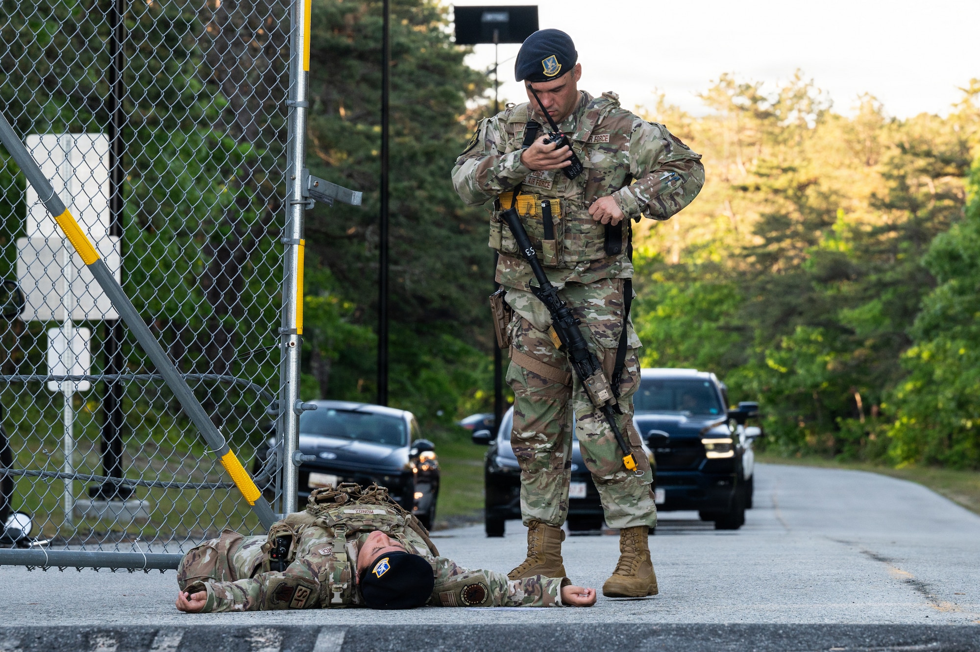 Photo of ANG Airmen performing their jobs during a military exercise.