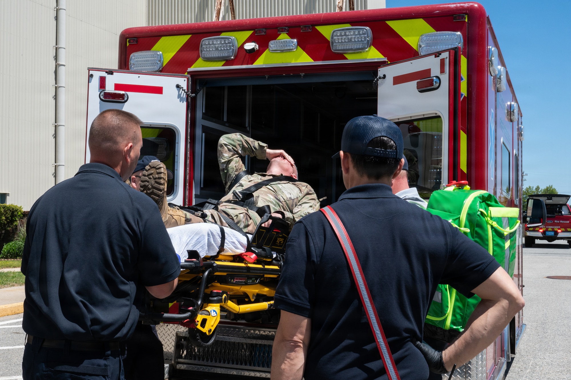 Photo of ANG Airmen performing their jobs during a military exercise.