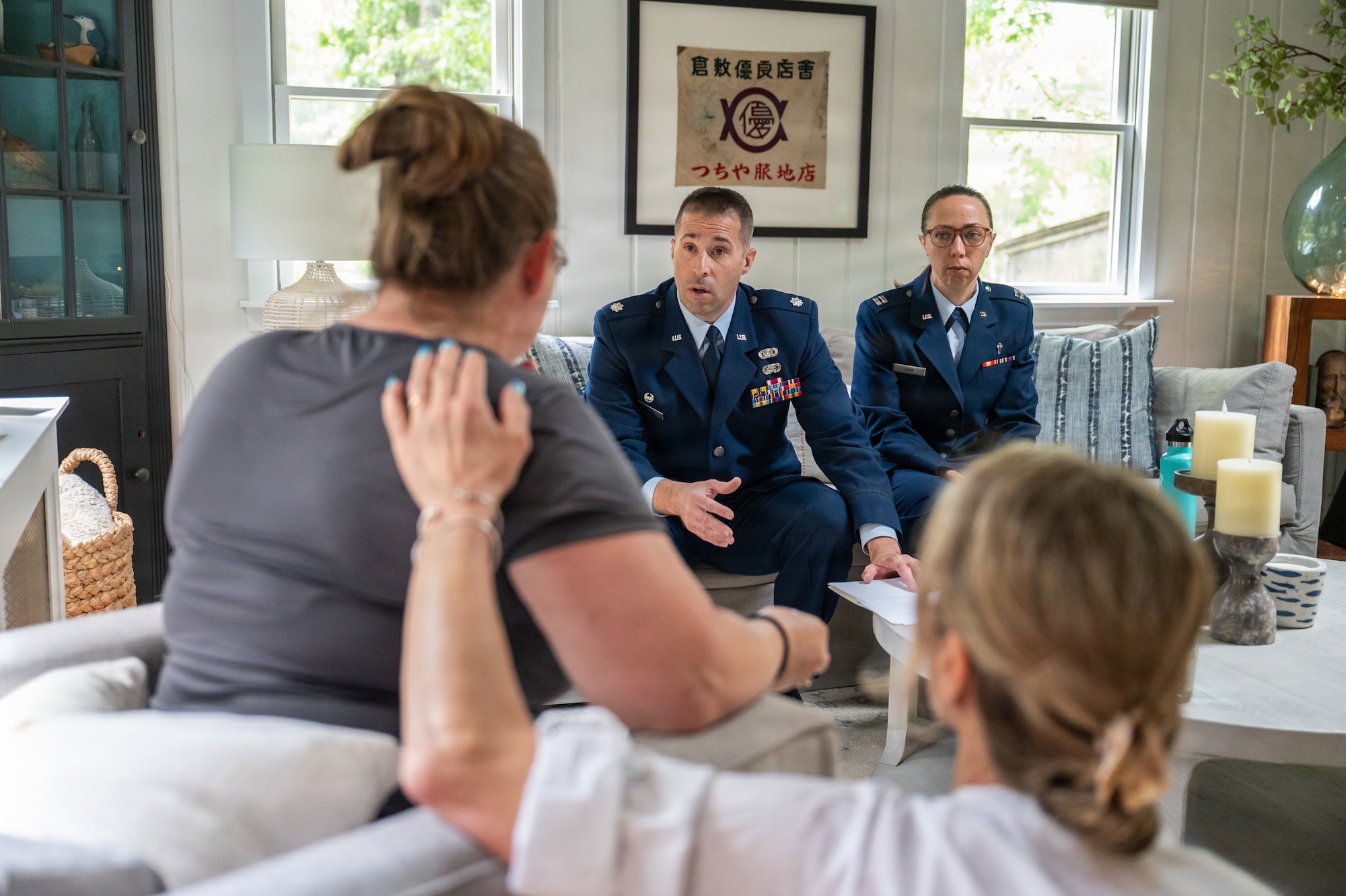 Photo of ANG Airmen performing their jobs during a military exercise.