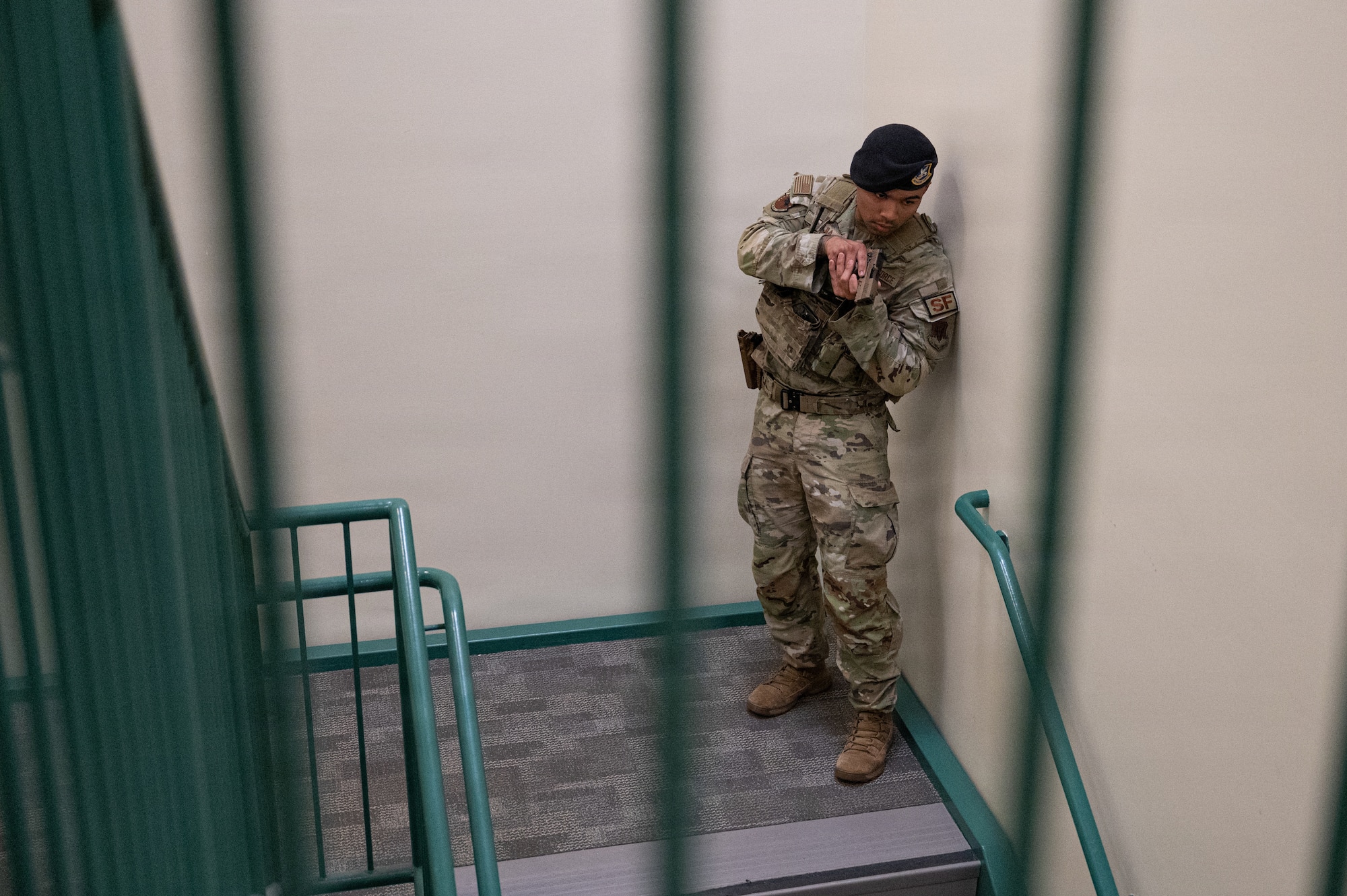 Photo of ANG Airmen performing their jobs during a military exercise.