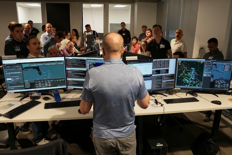 photo of people working at computers