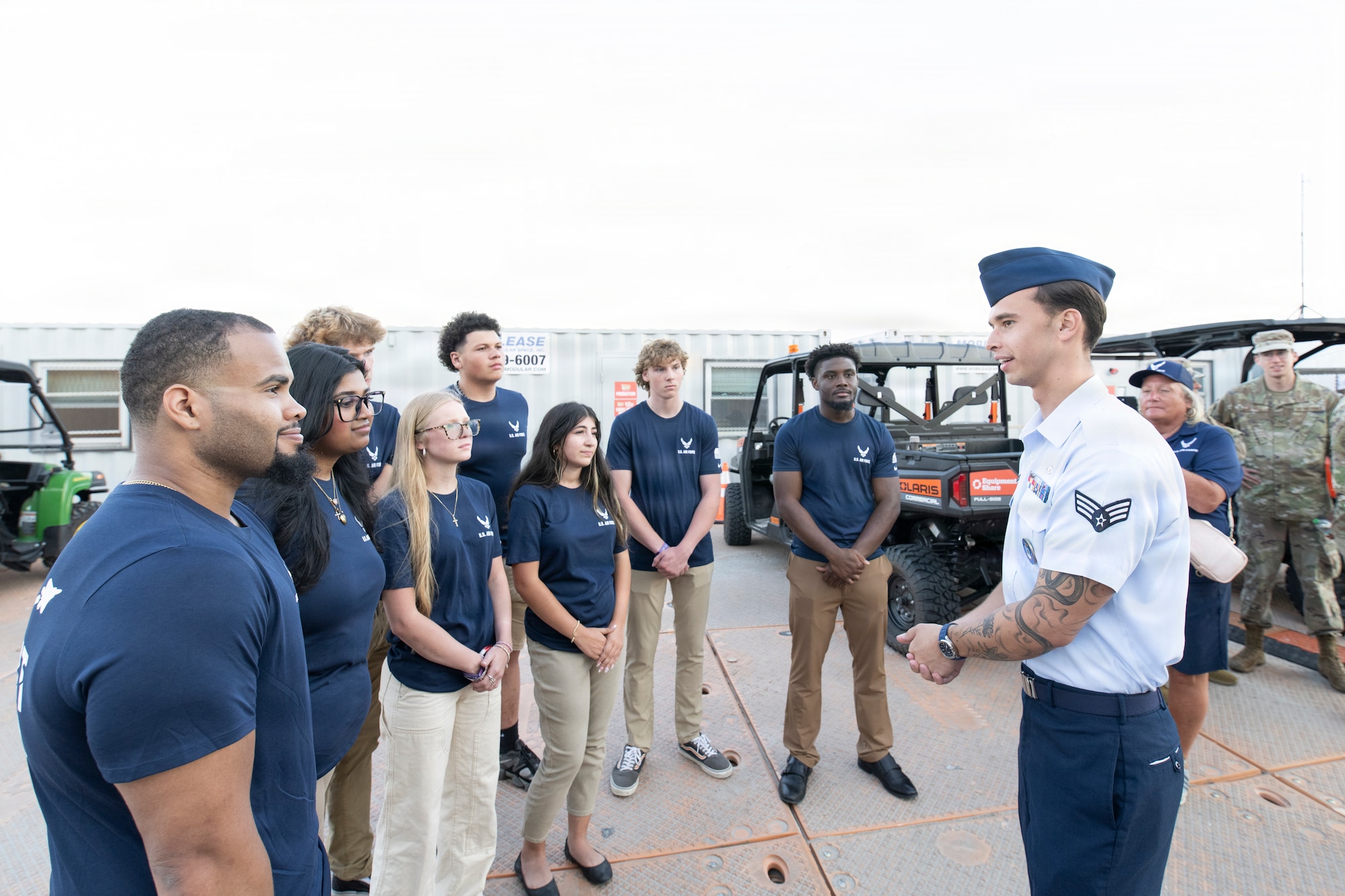 Senior Airman Roman Bereguta, U.S. Air Force Academy Preparatory School cadet-candidate, and one of the Outstanding Airmen of the Year for 2025, talks to delayed entry program members at the Barefoot Country Music Fest in Wildwood, New Jersey, June 21, 2026.