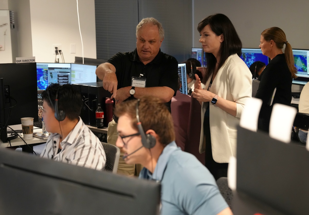 photo of people working at computers