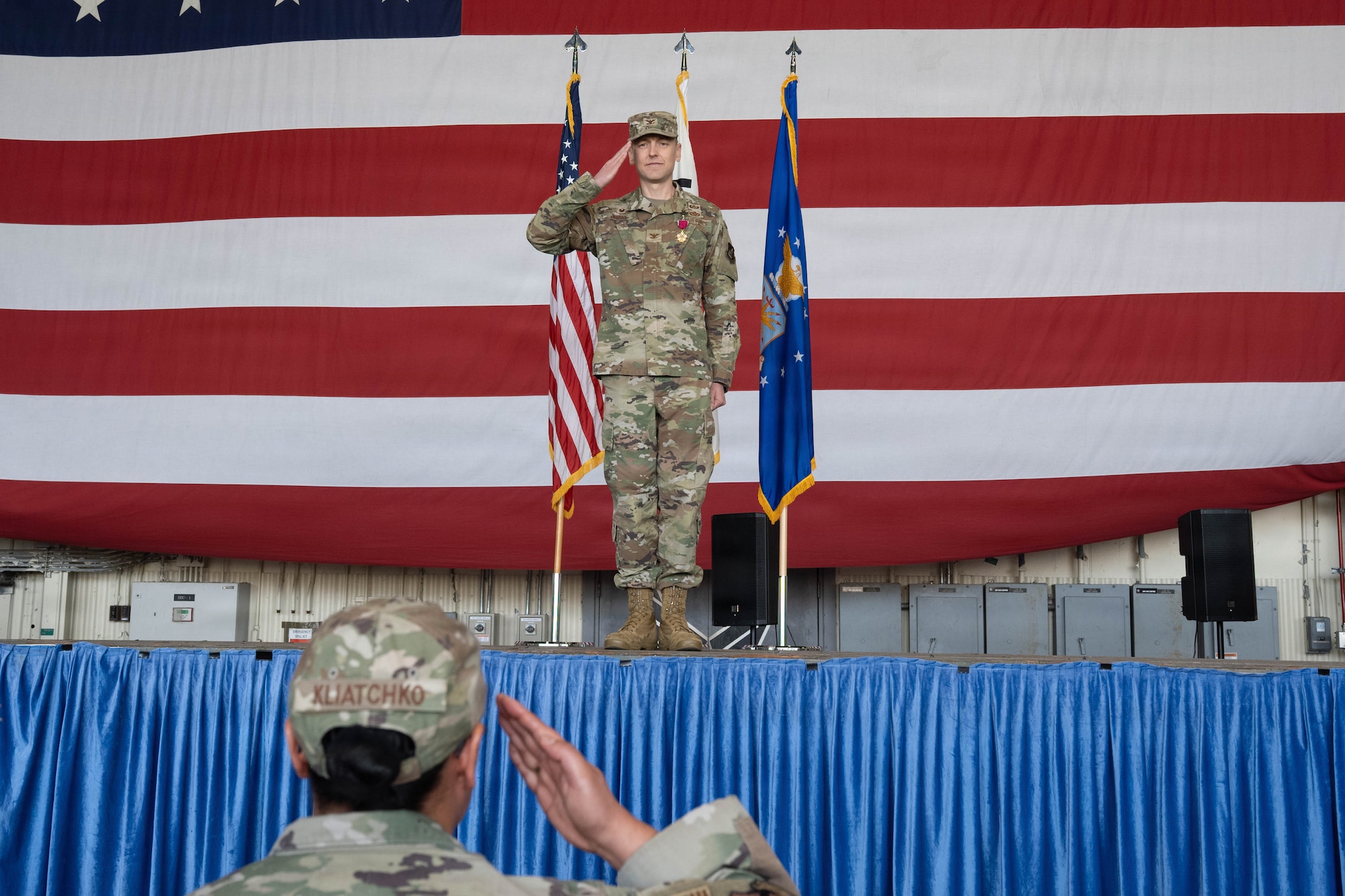 Commanders salute.