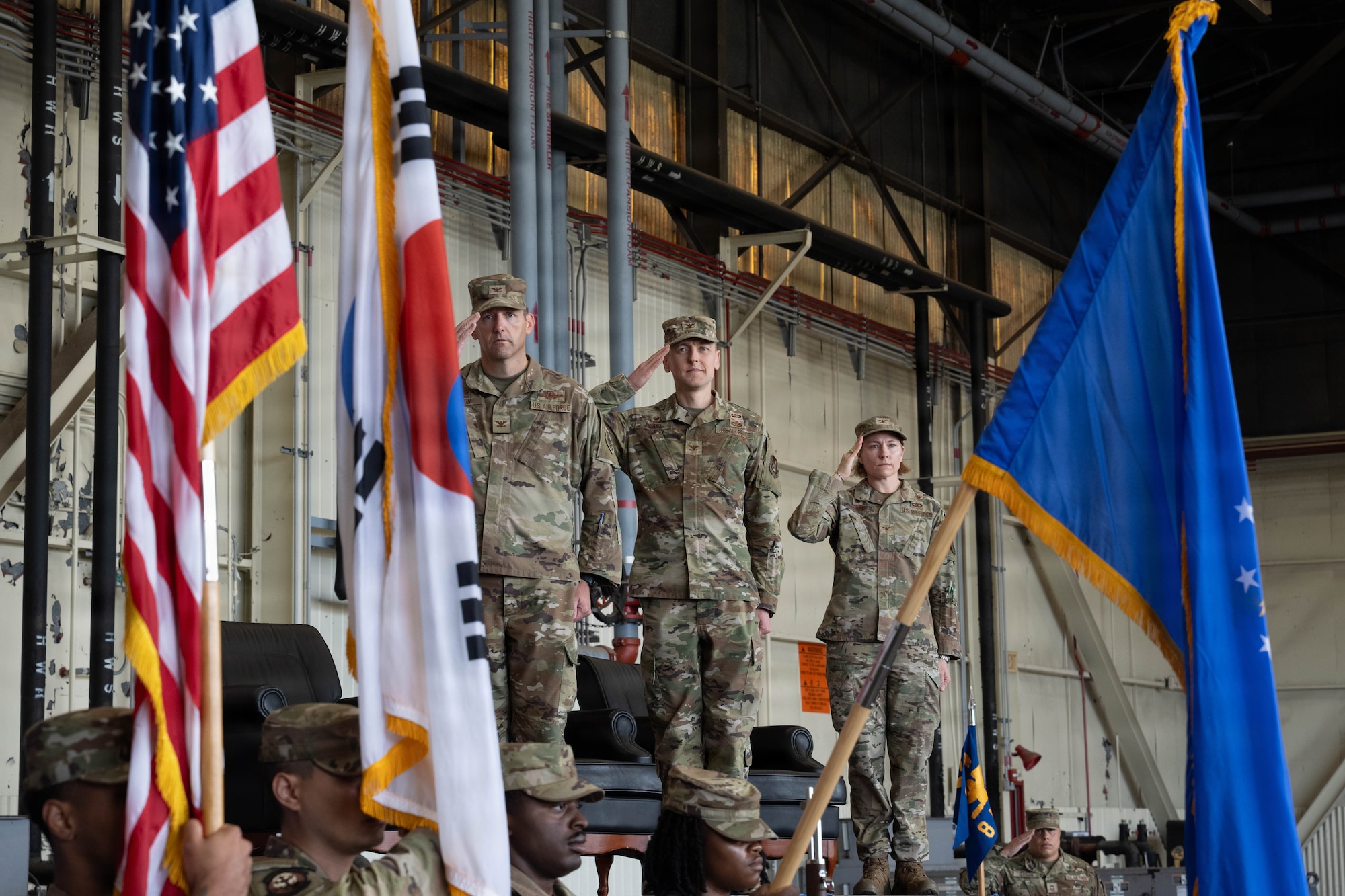 Commanders salute.