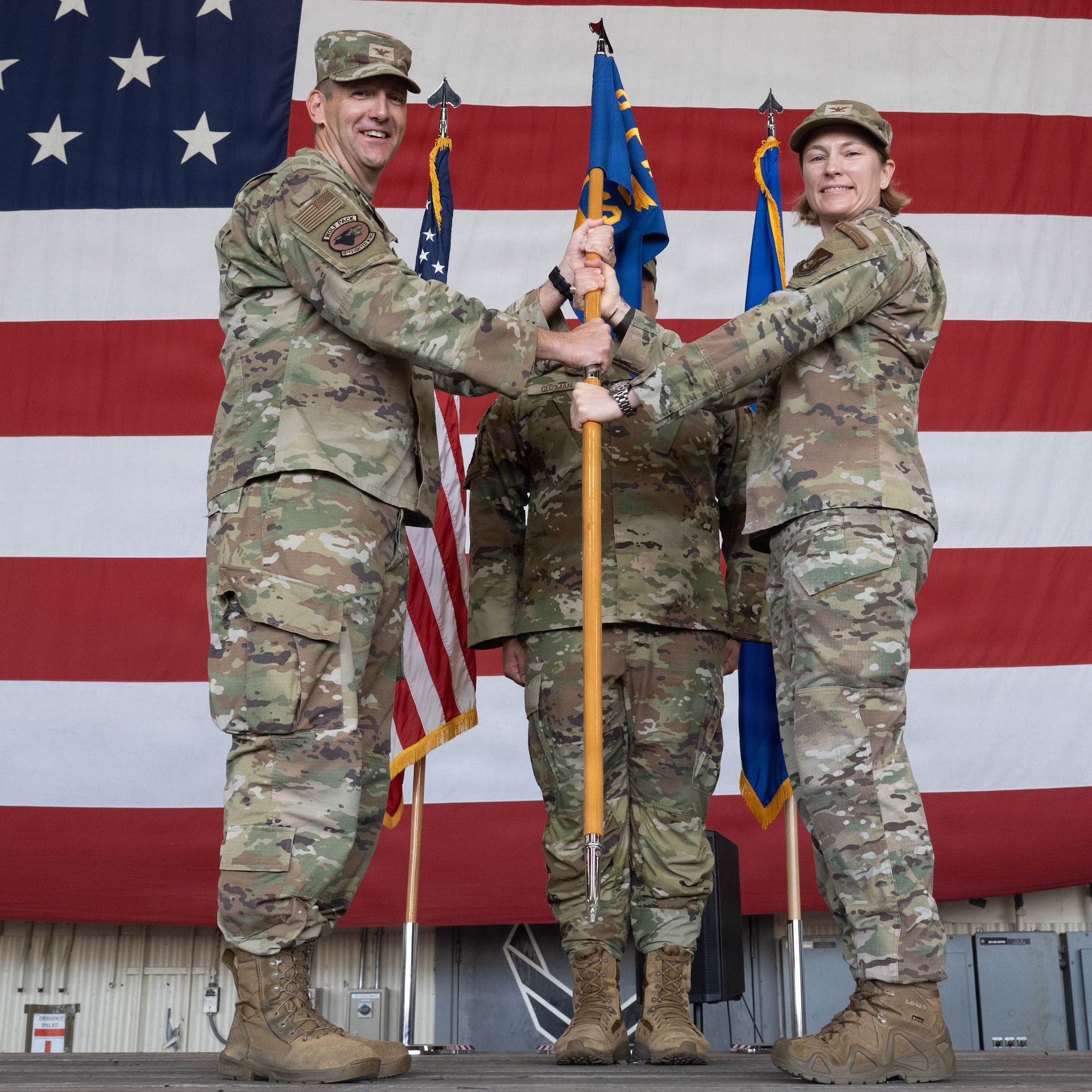 Commander receives guidon.