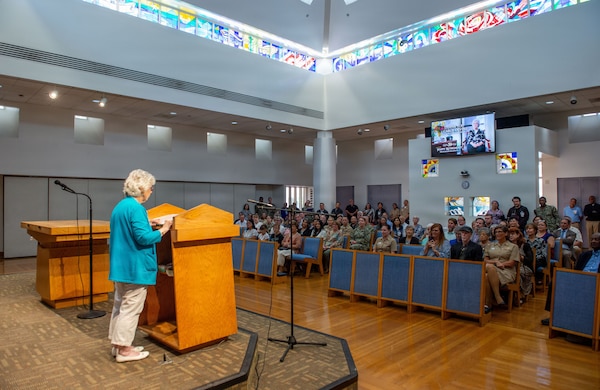 Carol Devine, executive assistant to the executive officer at Naval Medical Center San Diego (NMCSD), delivers remarks during her retirement ceremony at NMCSD, June 24, 2026. Devine retired after 59 years of federal service, including 49 years at NMCSD, where she served as a trusted advisor and administrative professional supporting generations of military and civilian leaders. The mission of NMCSD is to optimize health and enhance readiness. NMCSD employs more than 5,500 active-duty military personnel, civilians, and contractors in southern California to deliver exceptional care afloat and ashore. (U.S. Navy photo by Mass Communication Specialist 1st Class Marcus Stanley)