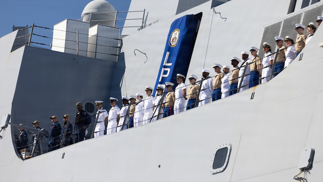 U.S. Marines and Sailors with Special Purpose Marine Air-Ground Task Force Sail 250, man the rails aboard the USS Arlington (LPD-24) as part of SAIL250 in Baltimore, Maryland, June 24, 2026.  Fleet Week Baltimore and SAIL250 Maryland celebrate America’s maritime heritage and the nation’s 250th anniversary by bringing together U.S. and international ships, Marines, Sailors, and community partners throughout Baltimore’s waterfront. (U.S. Marine Corps photo by Lance Cpl. Michael Robinson)