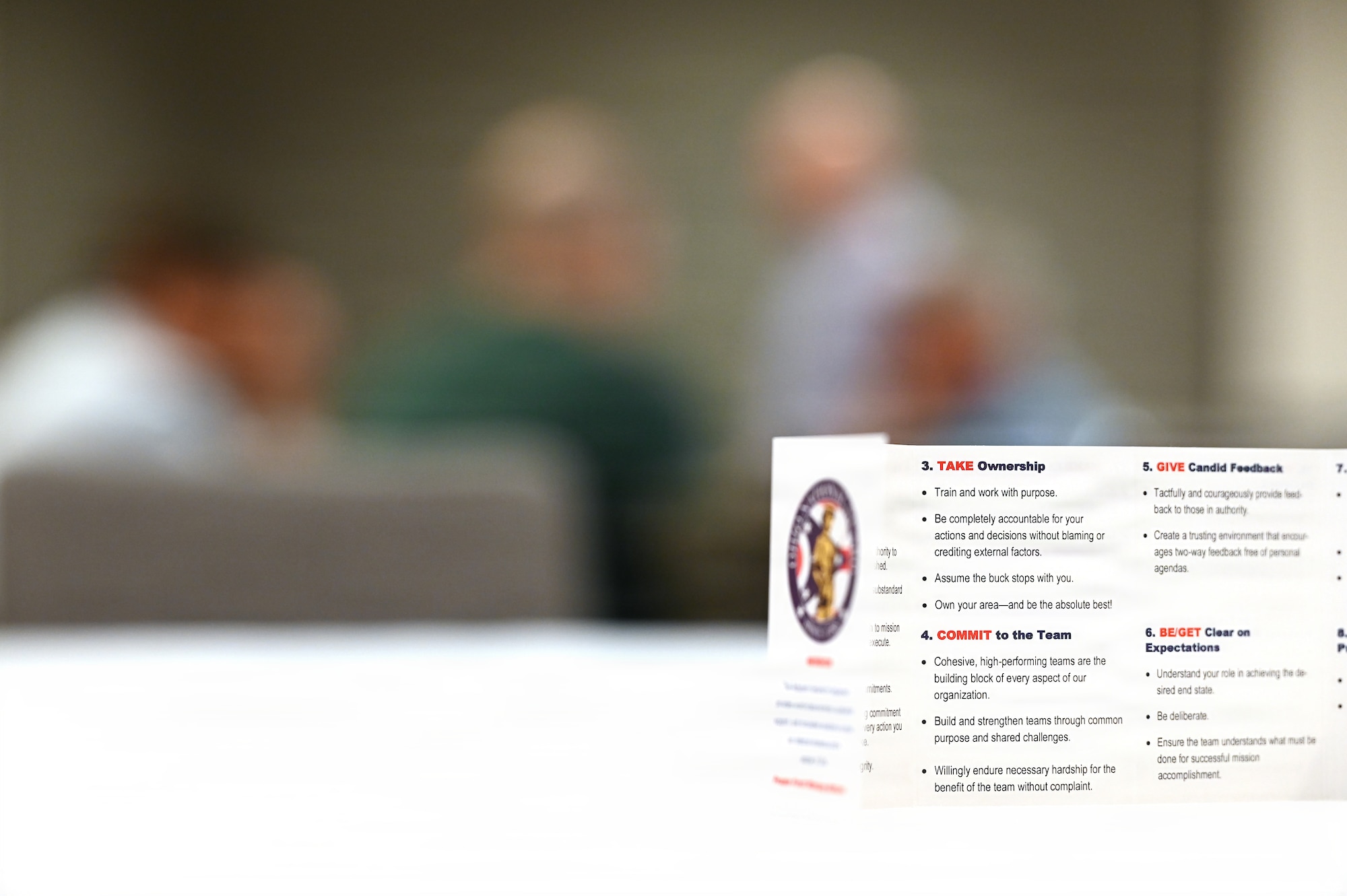 A wallet-size, foldable card displaying the Ohio National Guard's 19 Fundamentals sits on a table during a seminar on leadership and culture-building March 24, 2026 for the airmen of the 178th Wing at a hotel conference center in Springfield, Ohio. The seminar, attended by airmen from across the wing, focused on moving beyond culture by chance and instead intentionally defining the behaviors that drive organizational success by creating a cohesive culture that supports the organization’s mission. (U.S. Air National Guard photo by Shane Hughes)
