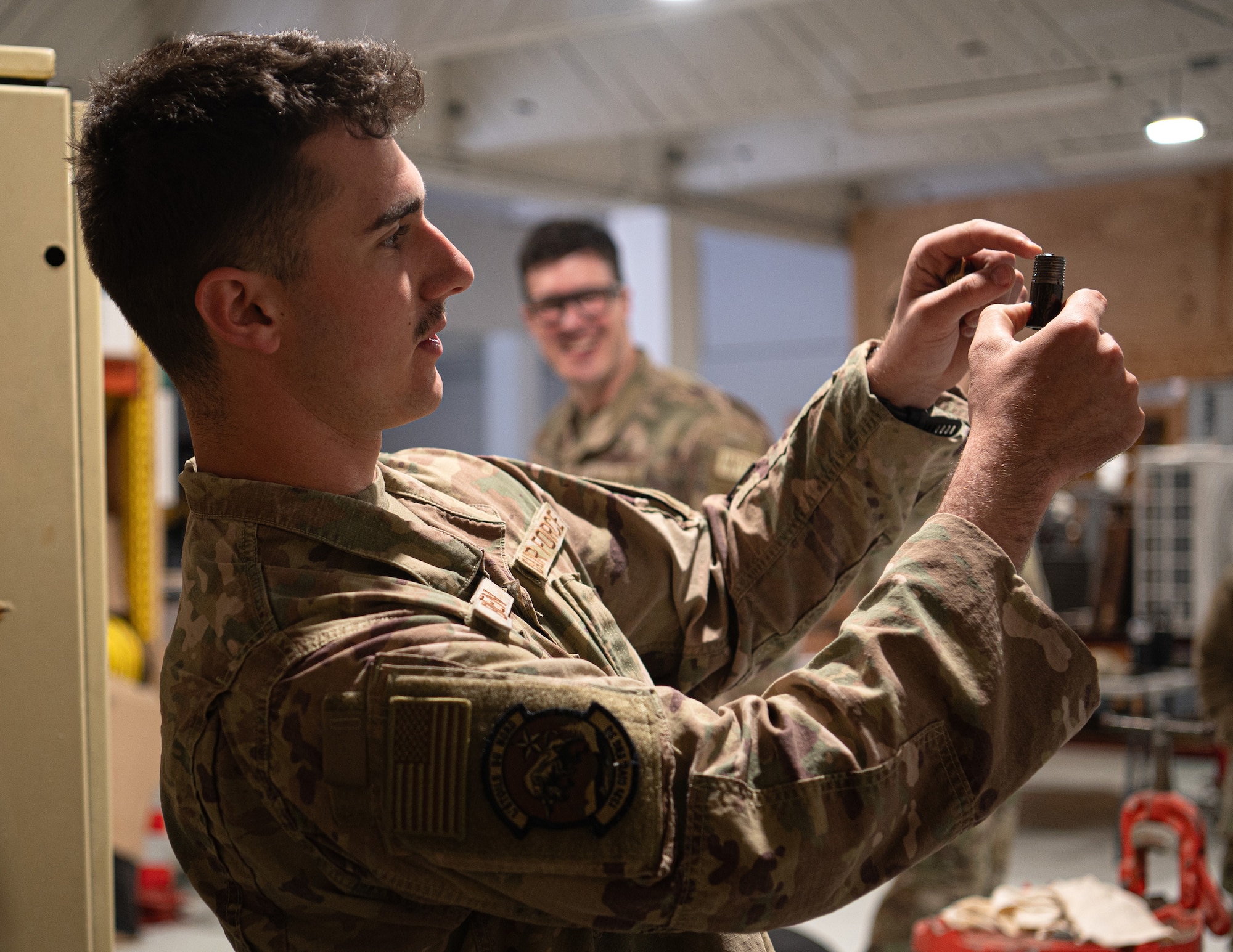 U.S. Air Force Airman 1st Class Isaiah Boehnen, 133rd Civil Engineer Squadron, examines pipe during base sustainment operations at Lajes Field, Azores, Portugal, May 12, 2026.