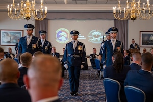U.S. Air Force Honor Guard Drill Team
members perform during the Air Force Honor Guard Banquet at Joint Base Anacostia-Bolling, Washington, D.C., June 19, 2026. The banquet was held to honor the Ceremonial Guardsman of the Year and the Order of the Praetorian inductees. (U.S. Air Force photo by Airman 1st Class Arlene
Carrara)