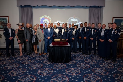 U.S. Air Force Honor Guard Order of the Praetorian inductees pose for a group photo.