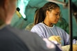 Sgt. Raijuenae Aravena, an animal care specialist assigned to the 422nd Medical Detachment Veterinary Service Support (MDVS), 338th Medical Brigade, took part in a simulated medical procedure on a mechanical dog during Operation Sentinel Justice at Camp Shelby, Mississippi, June 14, 2026. Operation Sentinel Justice is a large-scale U.S. Army Reserve training exercise that enhances Soldier and unit readiness, validates capabilities, and improves mission effectiveness through realistic, multi-echelon training in a dynamic operational environment. (U.S. Army Reserve photo by Pfc. Shemari Salkey)