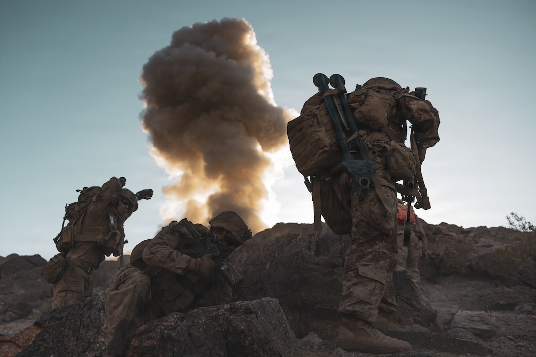 U.S. Marines with 1st Battalion, 24th Marine Regiment, 4th Marine Division, assault Machine Gun Hill during Integrated Training Exercise 3-26 at Range 400, Marine Corps Air Ground Combat Center Twentynine Palms, California, June 10, 2026. ITX is designed to generate combat readiness and ensure the Reserve Component provides critical strategic depth to the Total Force. From complex combined arms maneuvers to all-domain integration, these Marines are proving that they are ready to augment, reinforce, and fight alongside the active component at a moment's notice. (U.S. Marine Corps photo by Pfc. Ethan DePaul)