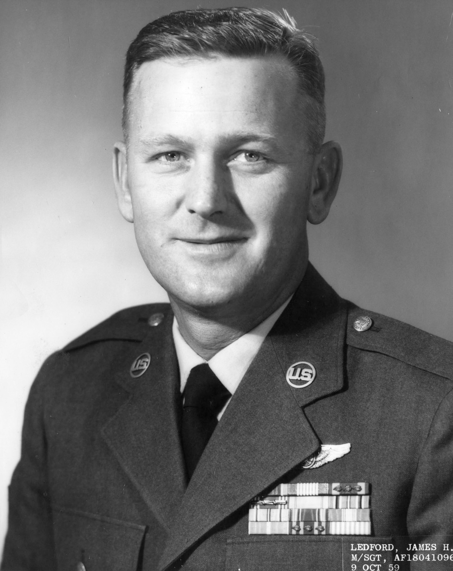 This U.S. Air Force official portrait shows Tech. Sgt. James H. Ledford. On Dec. 8, 1952, Ledford, a flight engineer on a B-26 Invader, earned the Distinguished Service Cross for saving his crew and aircraft after an anti-aircraft shell severely wounded the pilot over North Korea. (U.S. Air Force photo)