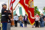 Side view of Marines presenting the Colors