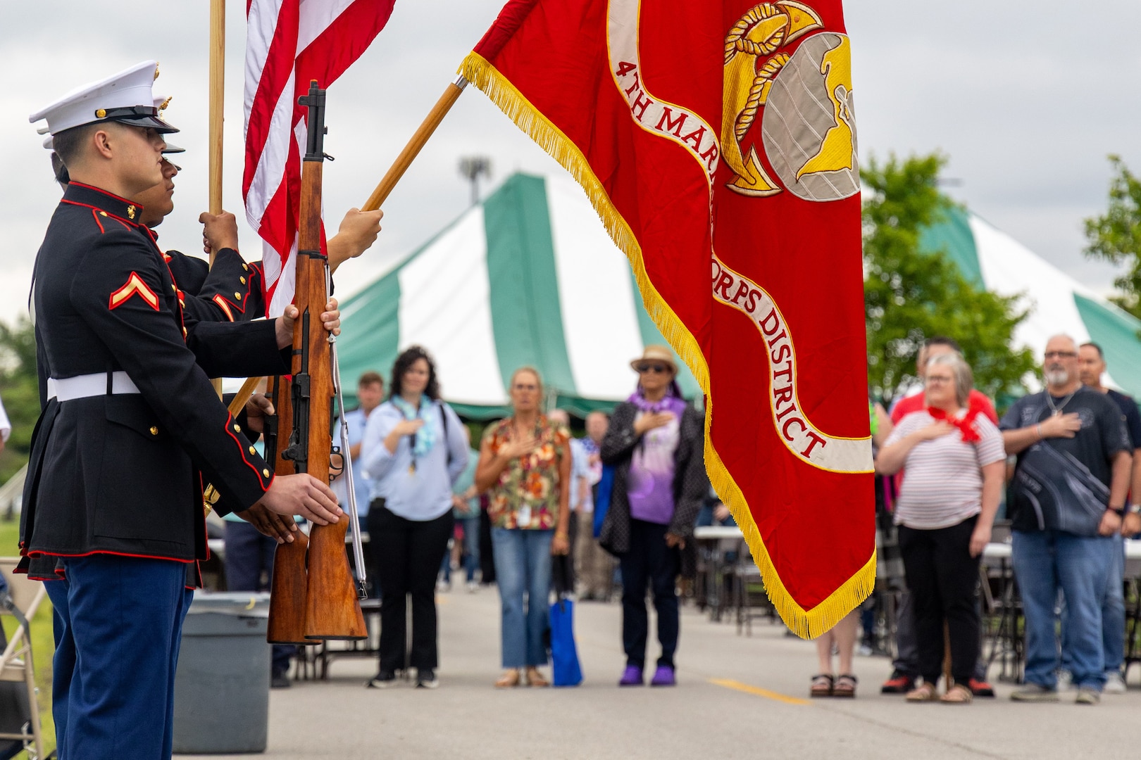 Side view of Marines presenting the Colors