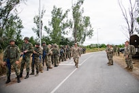 Security Forces Airmen from the Tennessee Air National Guard and Bulgarian Air Force form up before starting the capstone exercise for Falcon Defender 26, Graf Ignatievo Air Base, Plovdiv, Bulgaria, June 12, 2026.