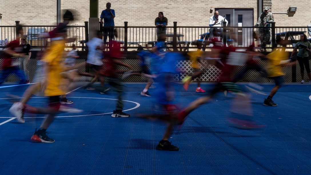 Students from the Joint Base Andrews Youth Center participate in the Presidential Fitness Test.