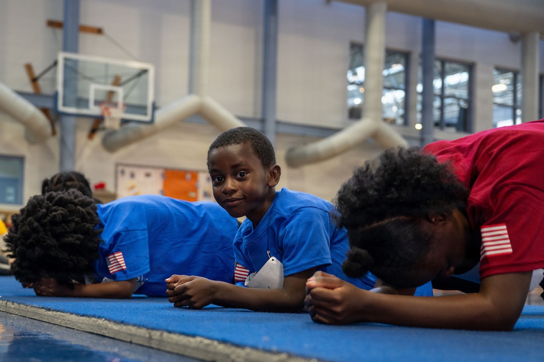 Students from the Joint Base Andrews Youth Center participate in the Presidential Fitness Center at Joint Base Andrews.