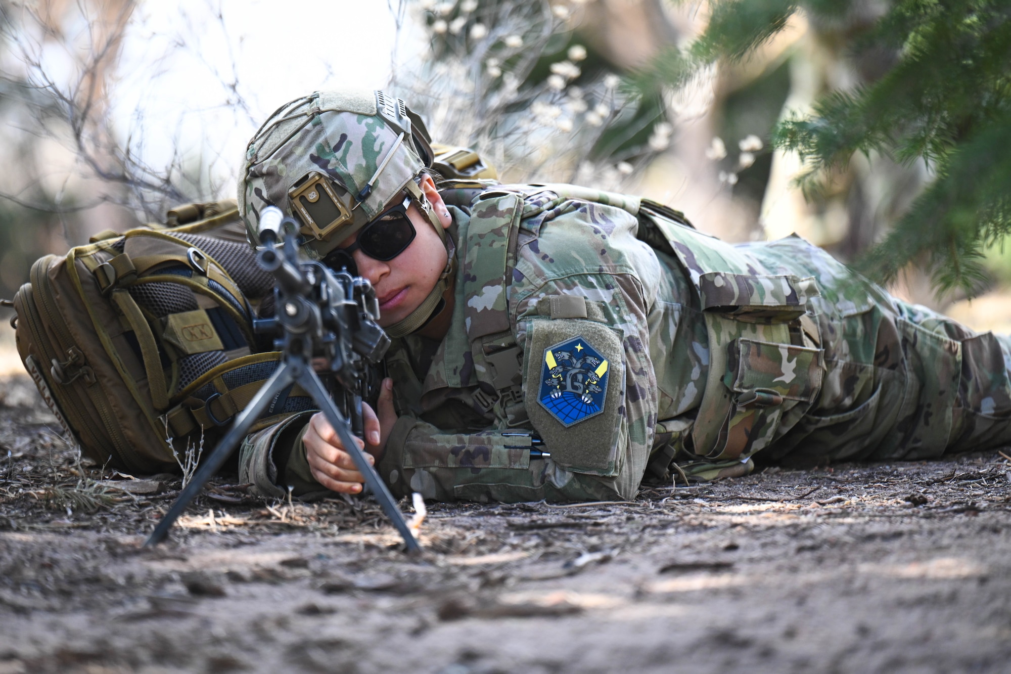 U.S. Air Force Airman 1st Class Laura Vilalobos, 21st Security Forces Squadron response force member, conducts training as part of a field training exercise on Peterson Space Force Base, Colorado, March 18, 2025. During the exercise, the Defenders of 21st SFS adapted their tactics to assess and respond to emerging battlefield threats. (U.S. Space Force photo by Senior Airman Justin Todd)