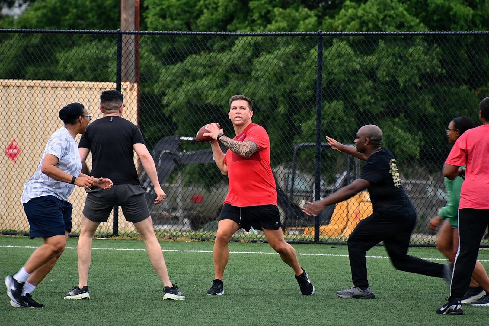 Hospital commander quarterbacking the BJACH offense down the gridiron during a football game on Anvil Field.